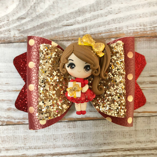 Pretty Christmas girl with present