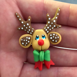 Reindeer head with bow