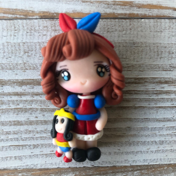Girl with Plush Toy Wonder Woman- magnolia maker